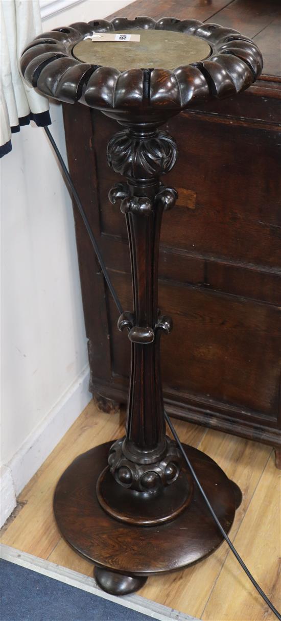 An early Victorian Anglo Indian carved hardwood cue stand H.97cm